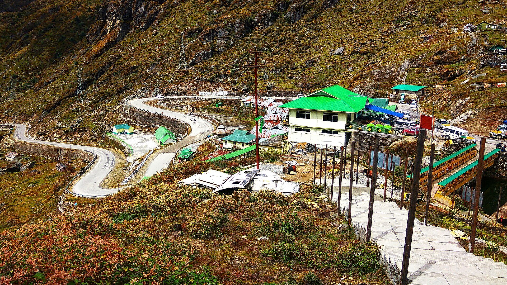 Winding alpine road and mountain pass outpost at Nathu La on the Indo-Tibetan border in East Sikkim